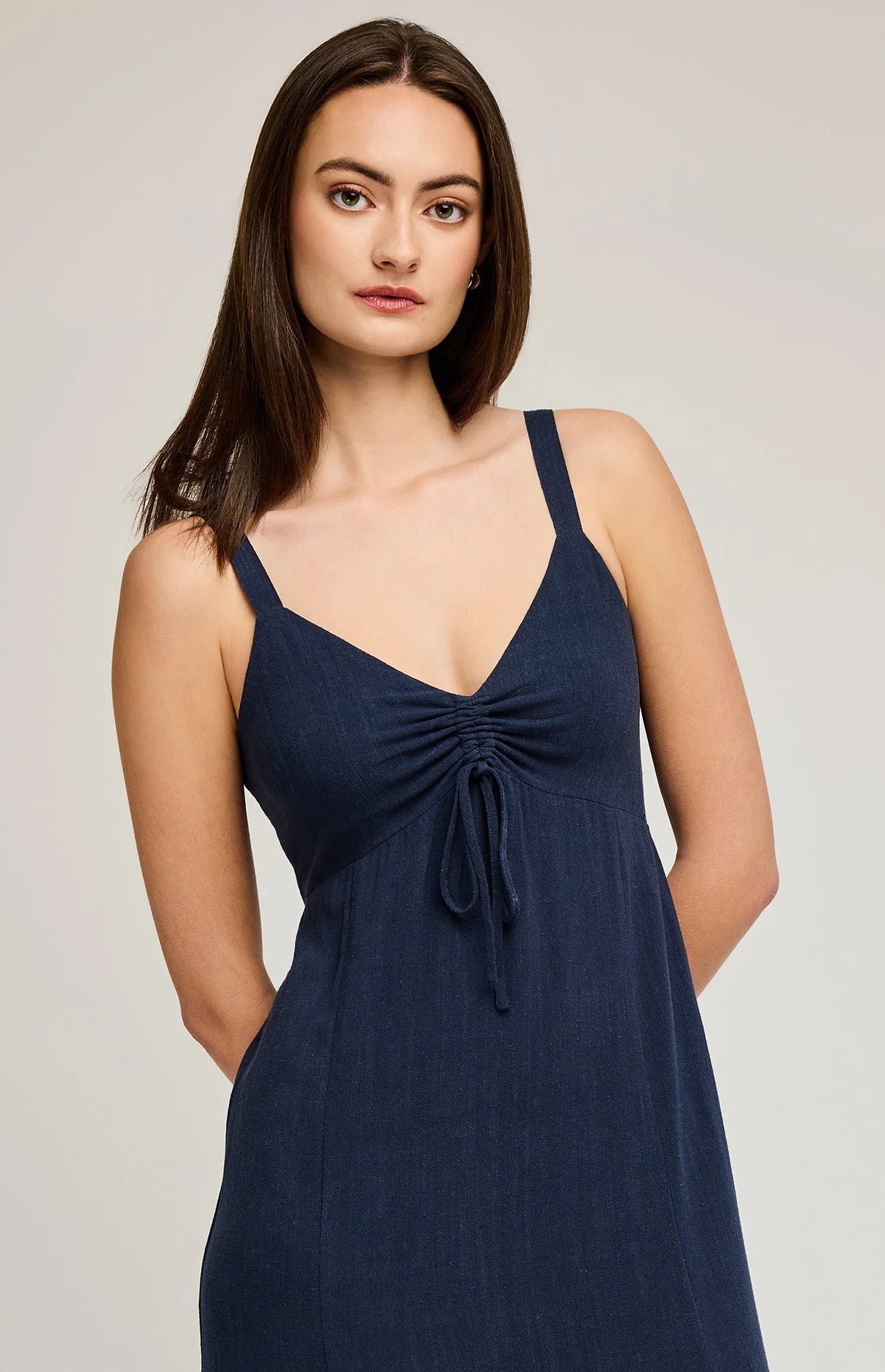 woman in navy linen dress sleeveless summer