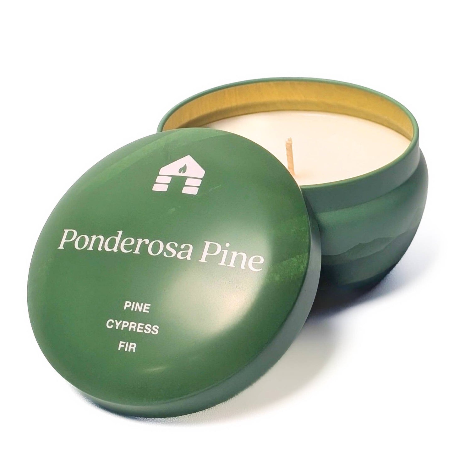 Green candle tin labeled 'Ponderosa Pine' with a white candle inside on a white background