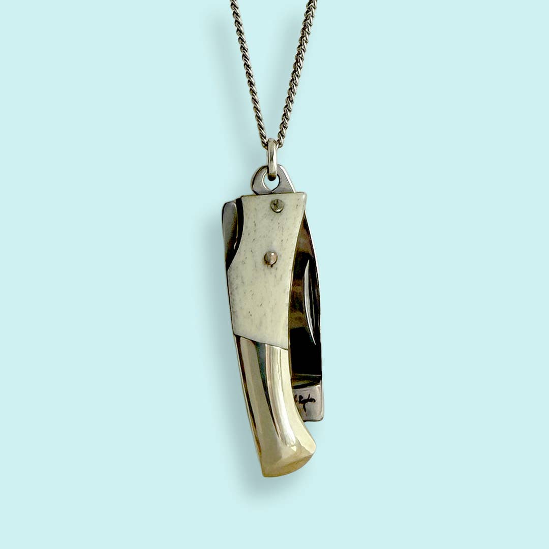 Curvilinear Bone Lockback Knife on Silver Chain Necklace