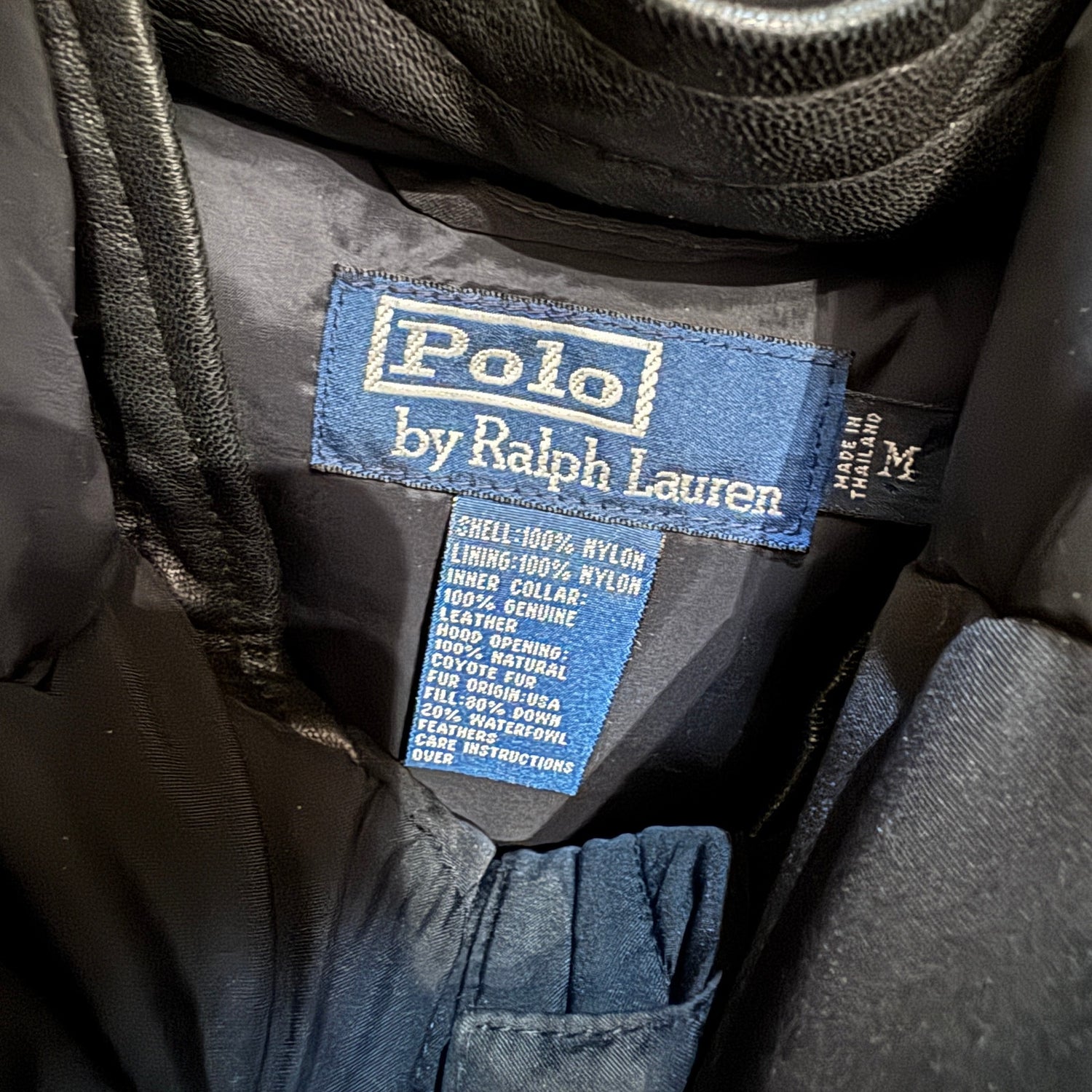 Polo by Ralph Lauren label on a garment with specifications.