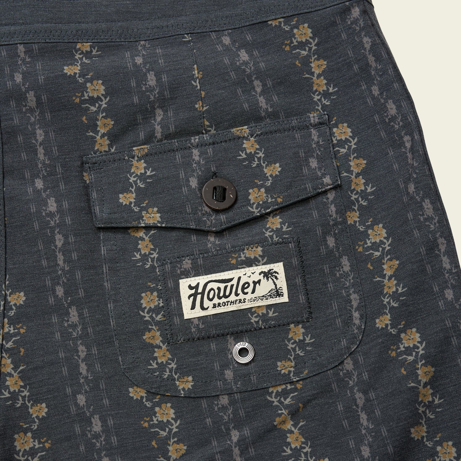 Floral patterned shirt with a Howler Brothers label on a pocket
