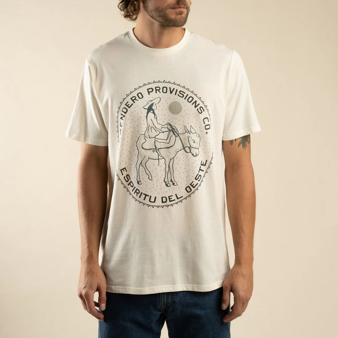 Man wearing a white t-shirt with a graphic design and text on a beige background