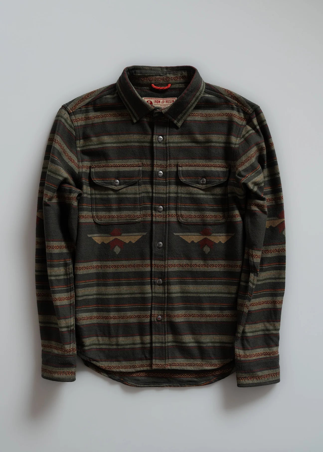 Striped shirt with a pattern on a white background