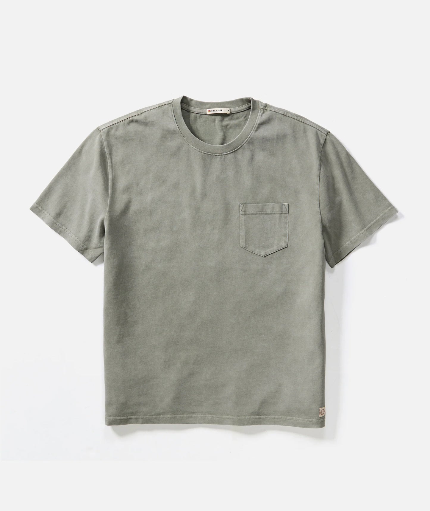 Green t-shirt with a pocket on a white background