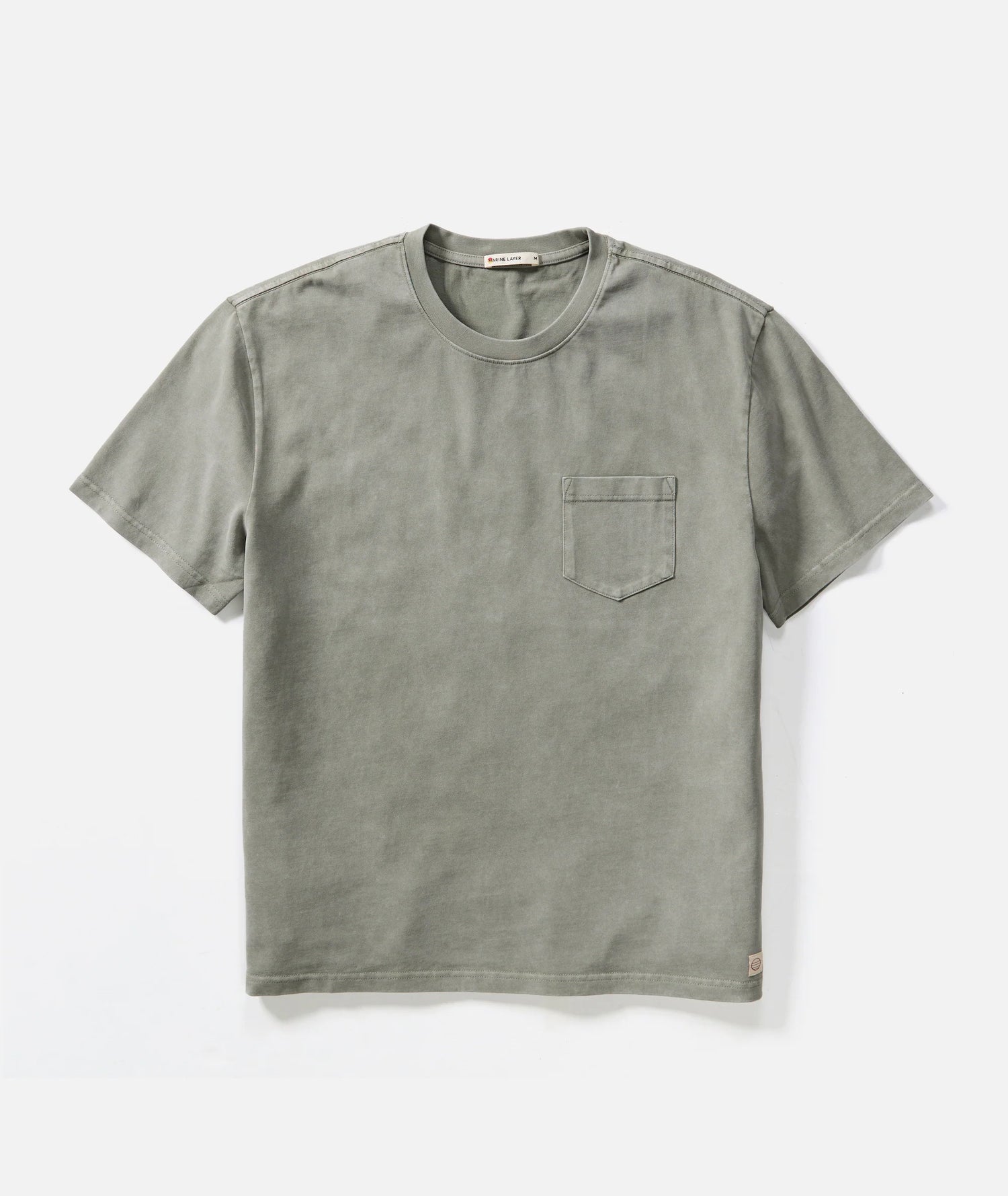 Green t-shirt with a pocket on a white background