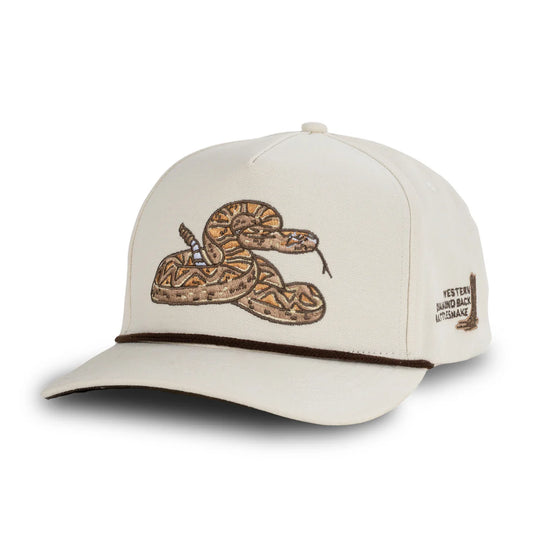 Beige cap with snake design on a white background