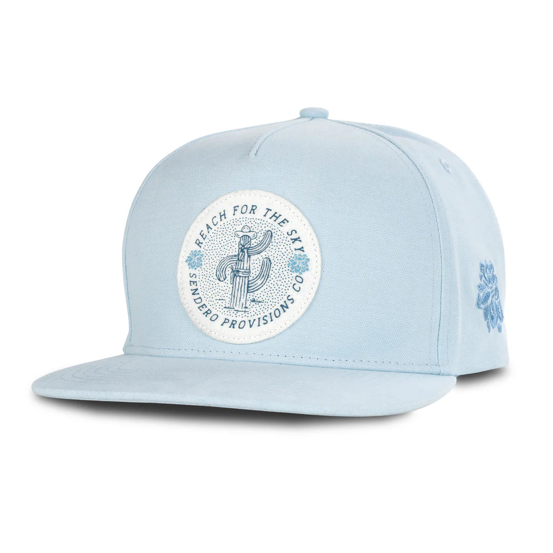 Light blue cap with a circular logo featuring a mermaid on a white background