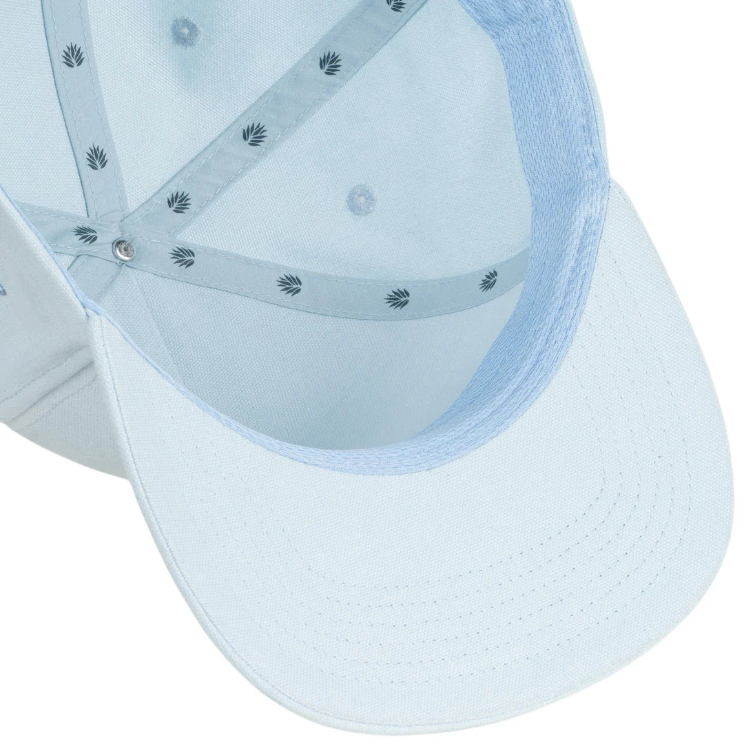 Close-up of a light blue cap with mesh back on a white background
