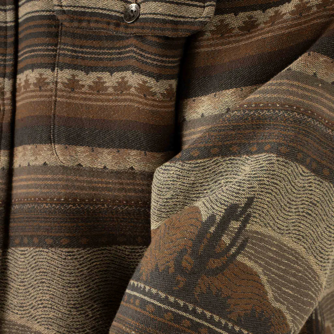 Close-up of a patterned fabric with earthy tones