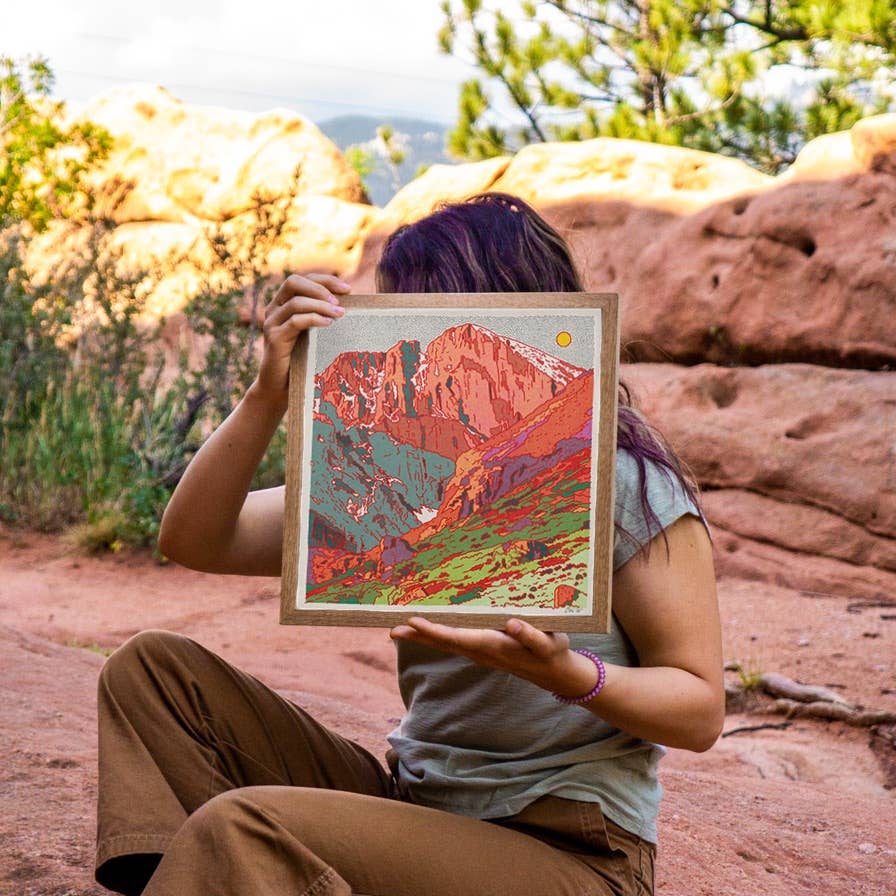 caroline clark art being held by artist