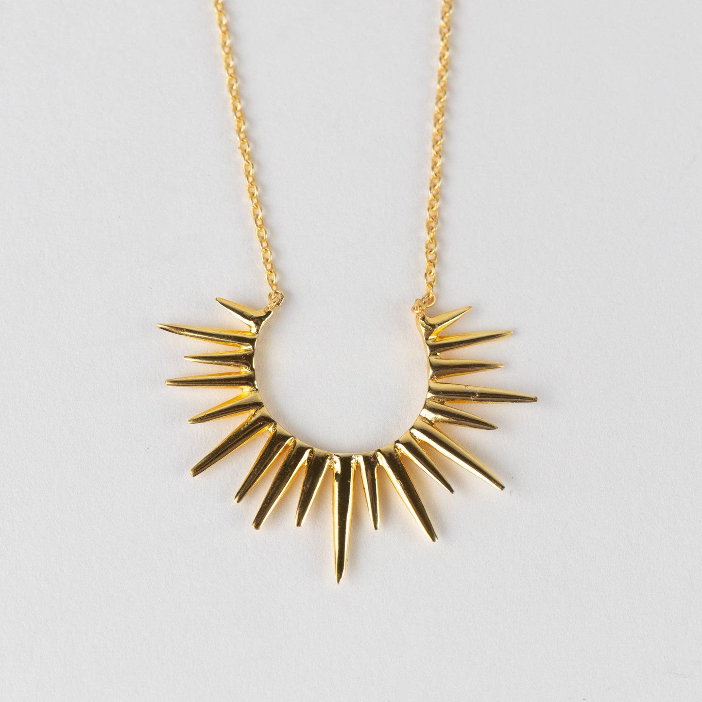 Kiranon Sunburst Gold Pendant Necklace