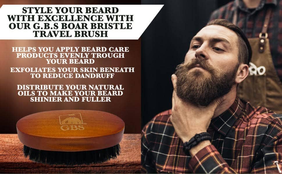Man with a beard using a G.B.S. boar bristle travel brush with product description text.