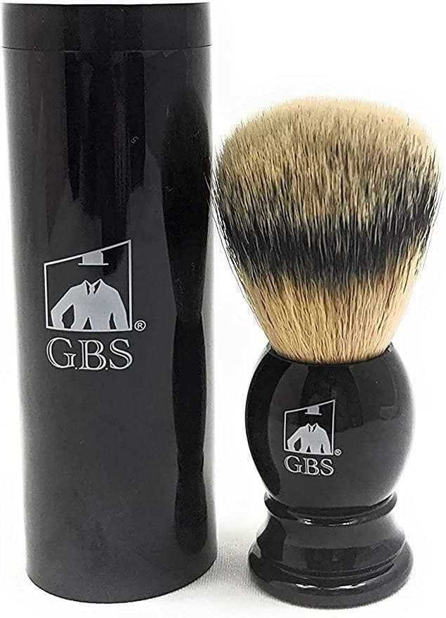 Shaving brush with black handle and bristles next to a black container also featuring the GBS logo.
