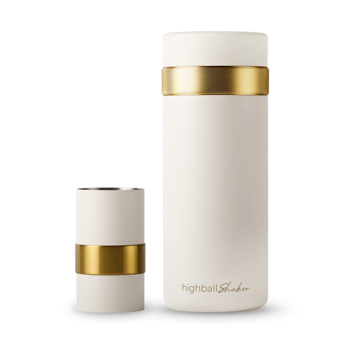 Two white highball shakers with gold bands on a white background, featuring the brand 'highballShaker'.