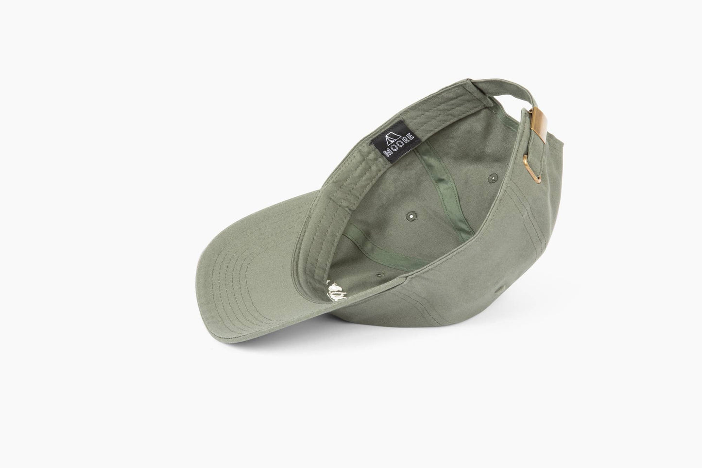 Green cap with a brand logo on a white background
