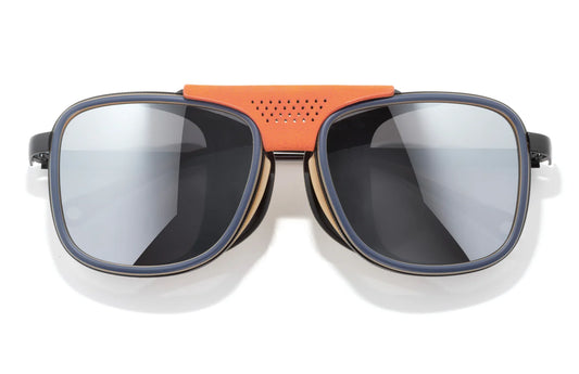 Sunglasses with a reflective lens and orange frame on a white background
