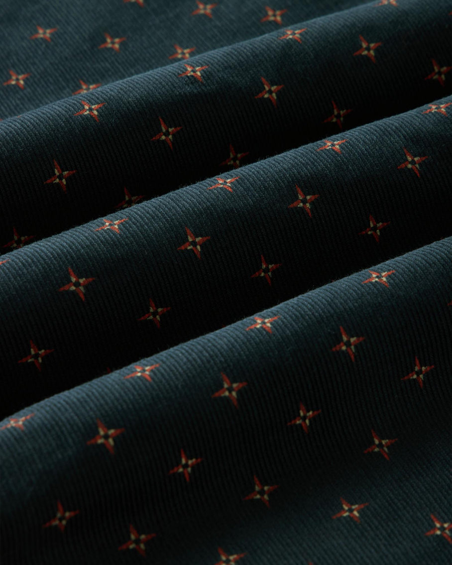 Dark blue fabric with small floral patterns