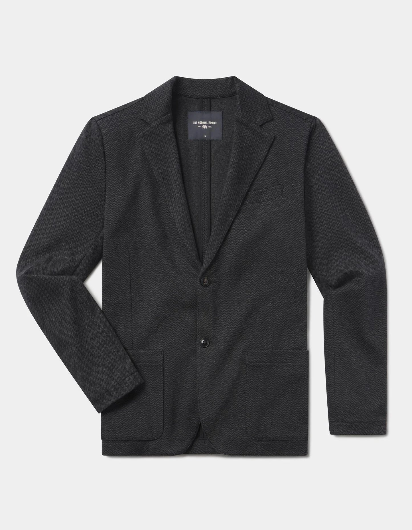 Black blazer on a light gray background