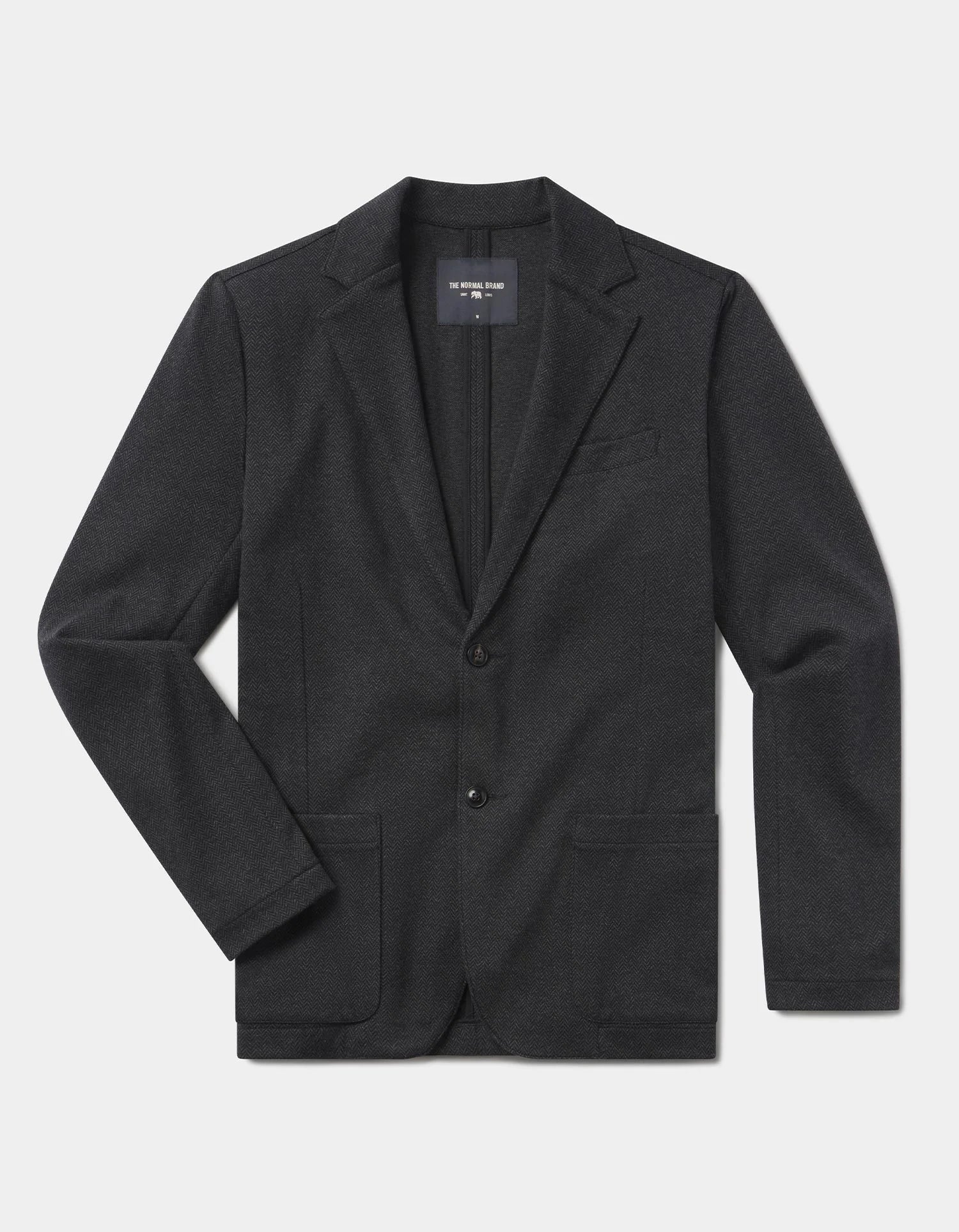 Black blazer on a light gray background