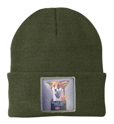 Green beanie with a patch featuring a dog on a white background
