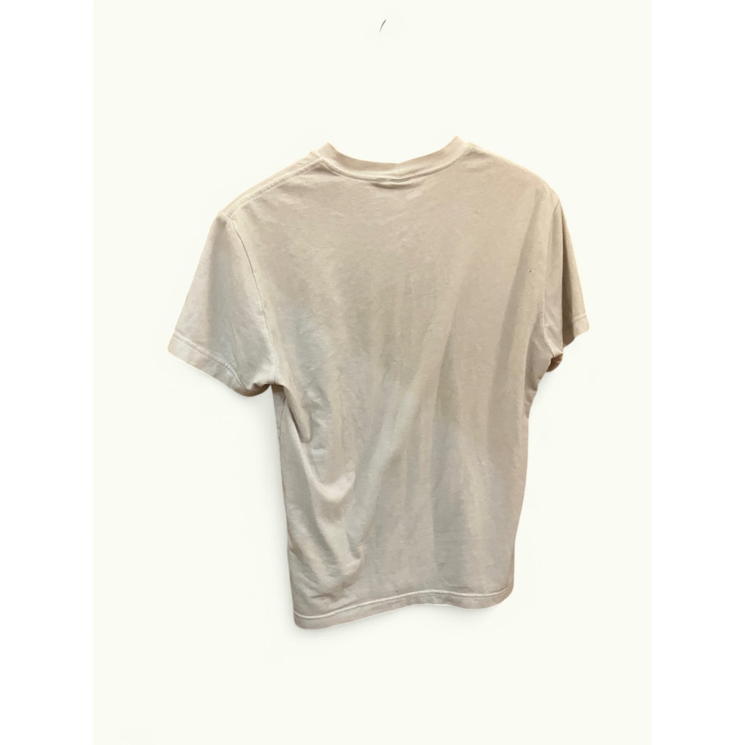 A light beige short-sleeve t-shirt shown from the back, hanging against a plain off-white background.