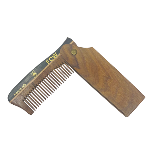 Wooden comb with a white background